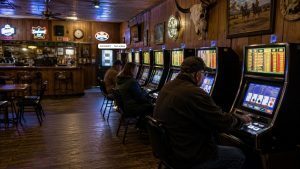 Video gambling machines inside a Montana bar, illustrating the state's video gambling industry during the 2014 revenue decline.