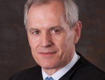 Judge Awaits DOJ Response After Arguments in Wire Act Hearing