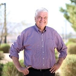 Nevada Governor Steve Sisolak smiling.