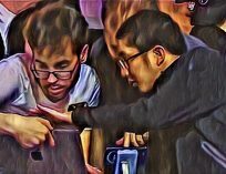 Jonathan Tamayo looking at laptop