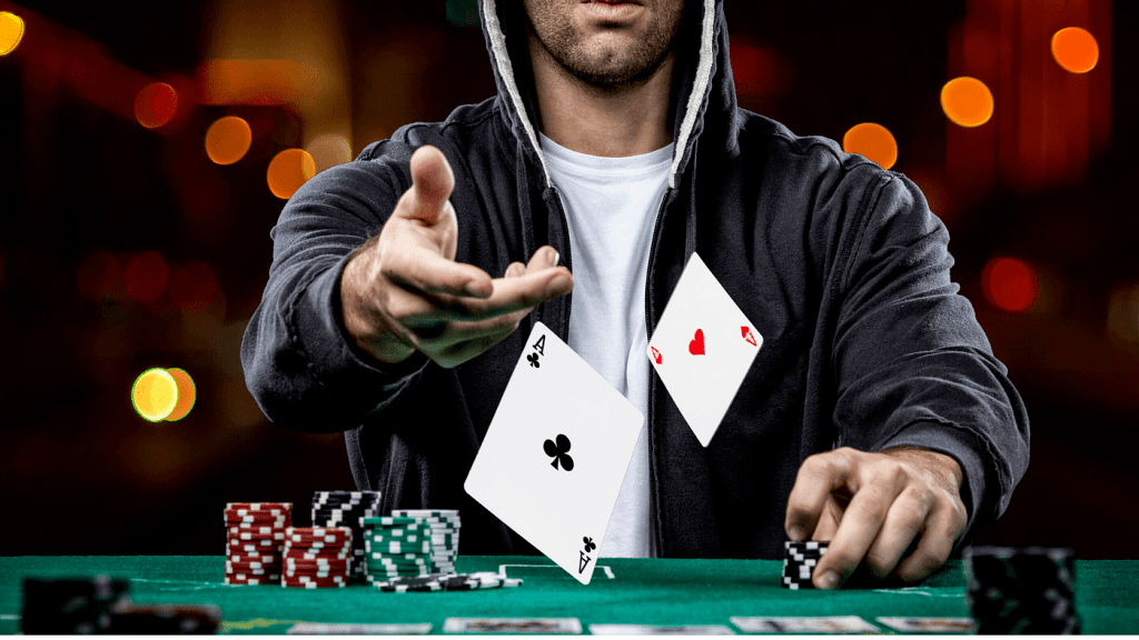 poker player throwing cards in the middle of the table