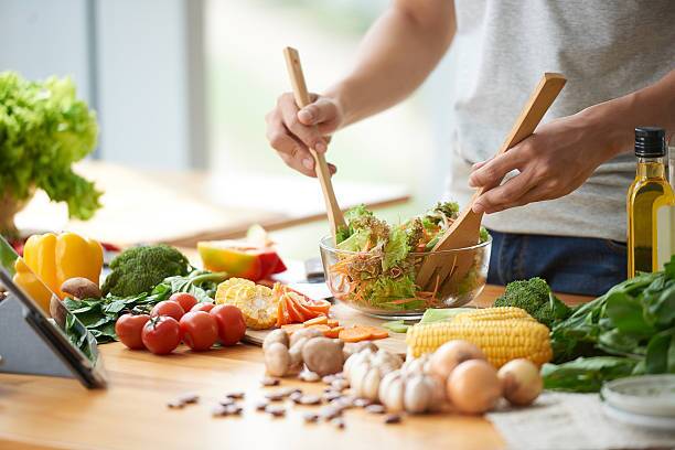 someone making a salad with Healthy Food
