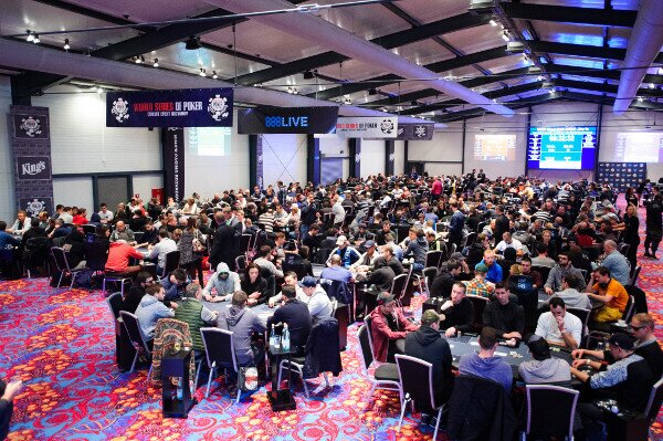 Large crowd of people at a poker tournament