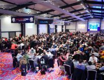 Large crowd of people at a poker tournament