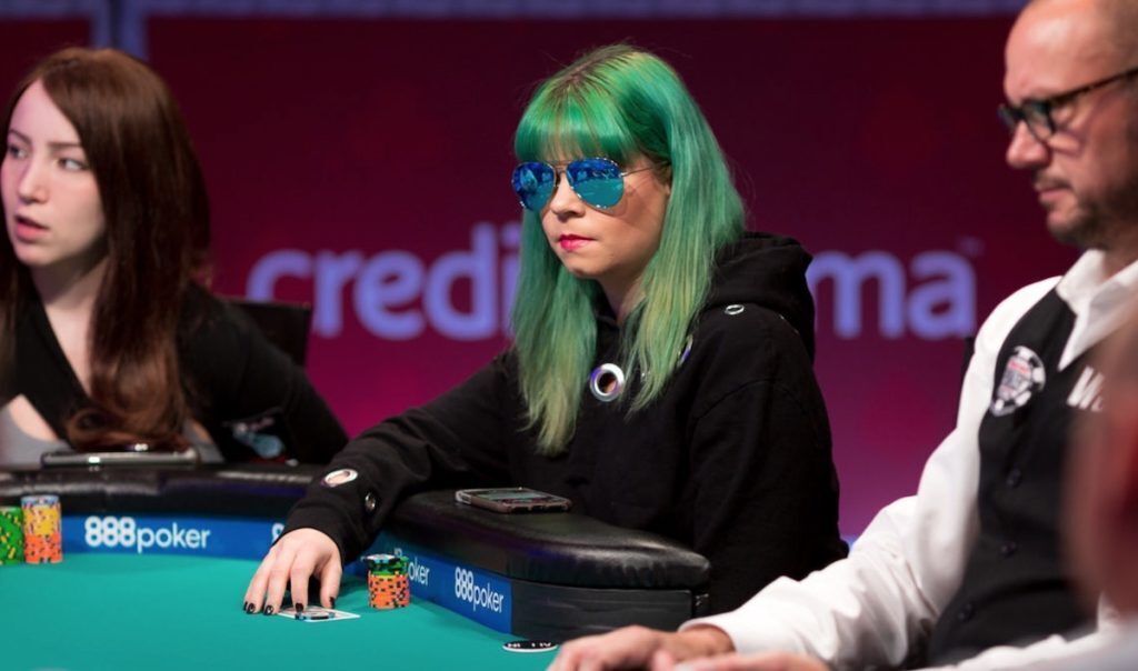 Annette Obrestad with green hair playing poker