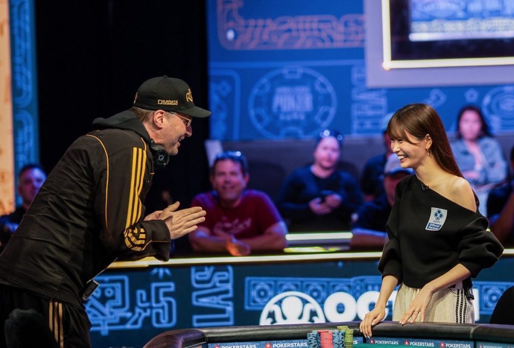 shiina Okamoto with Phil Hellmuth after a WSOP win
