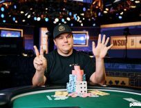 Shaun Deeb With his Winning poker chips and hand