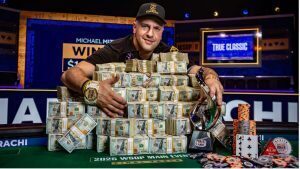 michael mizrachi with stack of cash at WSOP Main Event