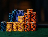 stacks of chips on a poker table to exemplify pot control