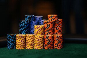 stacks of chips on a poker table to exemplify pot control