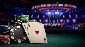 Stacked poker chips and pocket aces on a table with a blurred WSOP-style tournament stage in the background, representing Main Event betting odds and high-stakes play