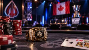WSOP Circuit ring and poker chips on a tournament table with a Canadian flag in the background.