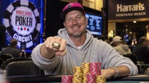 AI-generated image of Robert Gianquitti celebrating his 2026 WSOP Circuit Pompano Beach Main Event victory, displaying a championship ring at the poker table.